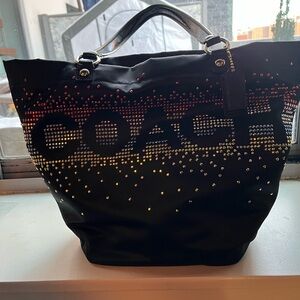 Coach Black Tote with Gradient Gold and Rose Stud Logo